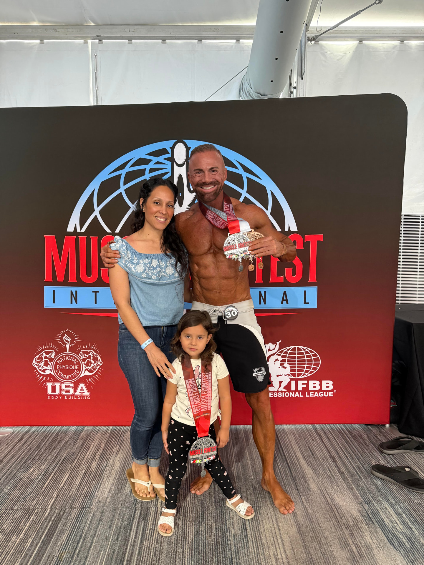 Tyler Stanley celebrating a competition win with his family